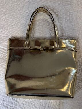 Vintage authentic Kate Spade Metallic Gold Purse with bow